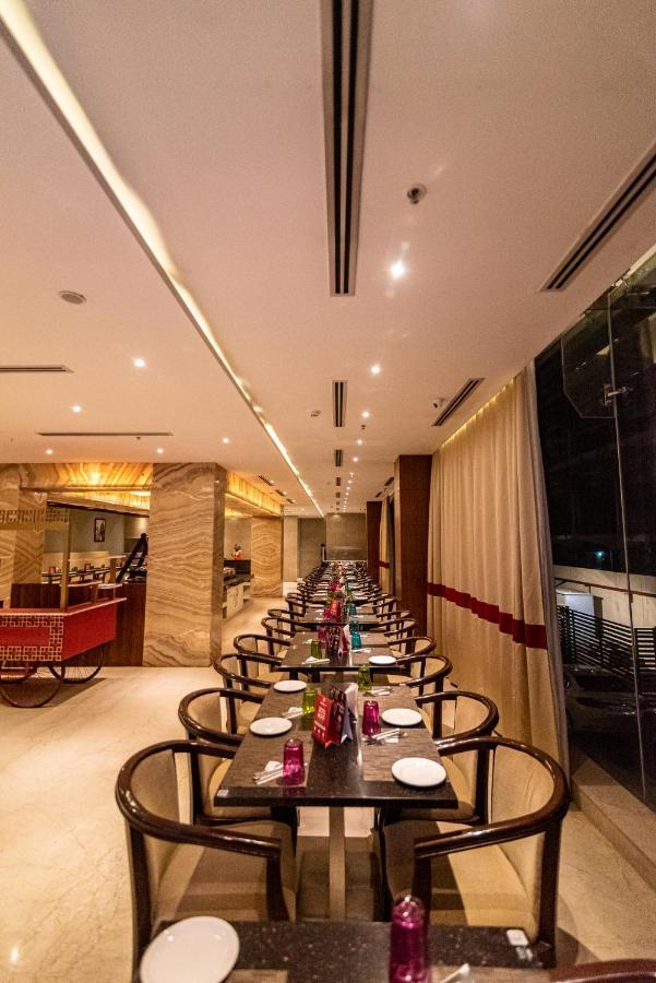 Bhagini Icon Premier Hotel Bangalore Esterno foto